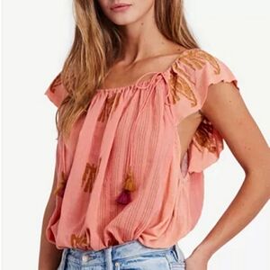 Free People Pukka embroidered peasant tassel top